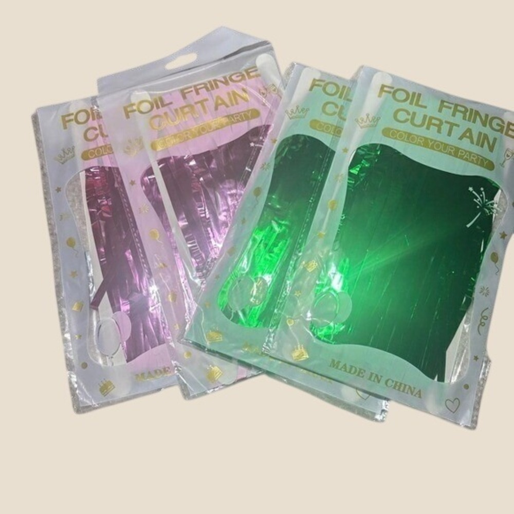 4 pack Foil fringe curtains in pink and green party decor inspo themed party